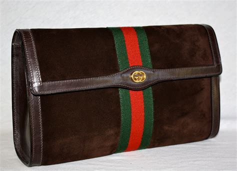 gucci brown clutch|gucci vintage suede clutch.